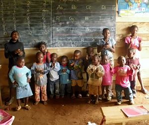 Small kids near blackboard.jpg